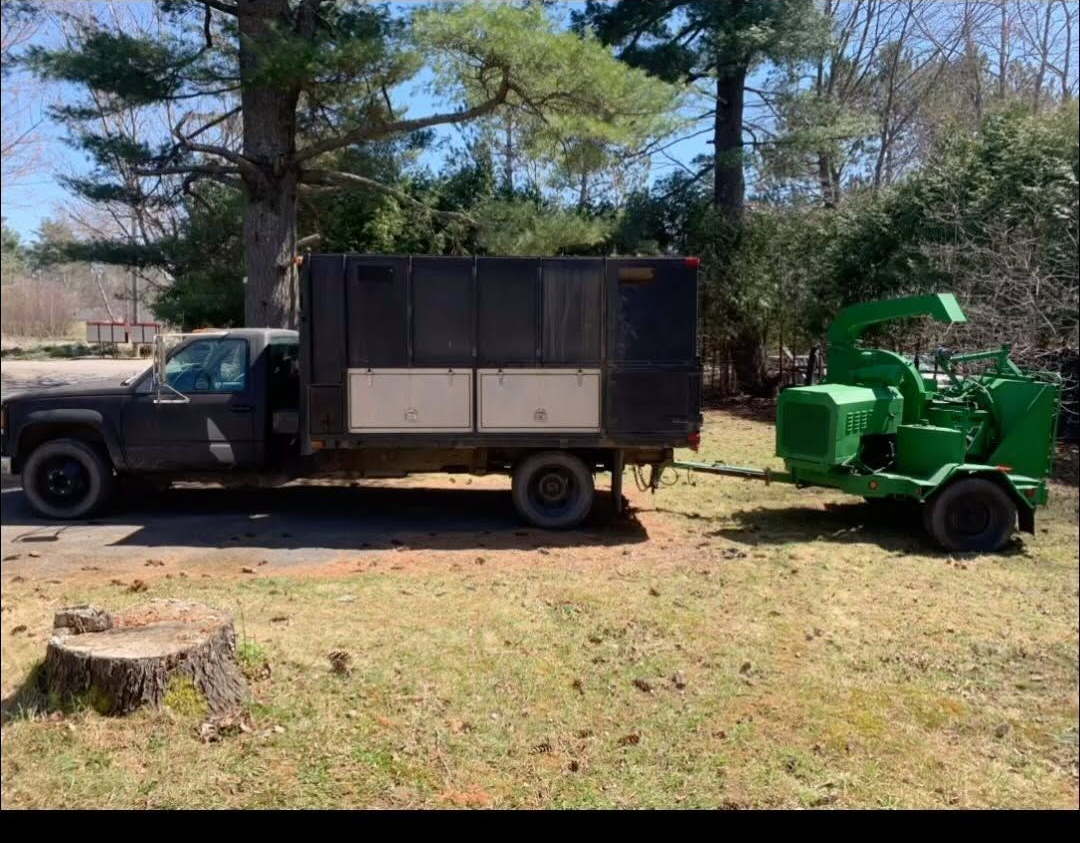 Cunningham Tree Services truck, dump trailer and wood chipper rig